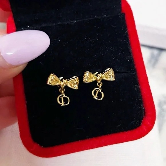 Dior Gold Bow Earrings with Logo Charm